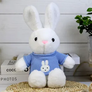 Cute white rabbit plush toy with a blue knitted sweater, soft stuffed doll gift for kids.
