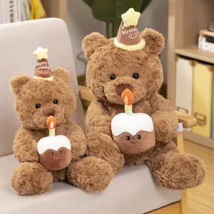 Cute brown plush teddy bear toy holding birthday cake with party hat, soft gift for kids girls
