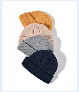 Close-up view of multi-color knitted docker hats showing four distinct stylish color options.