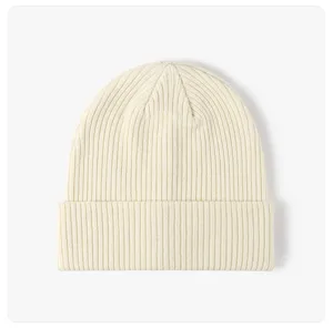 Classic ribbed knit beanie in cream color, perfect for cozy autumn and winter daily wear warmth.