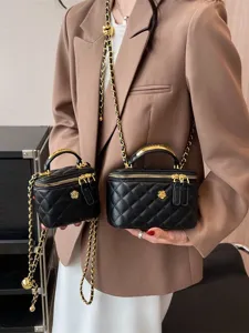 Women's quilted chain crossbody bag, stylish black vanity handbag with top handle for spring.