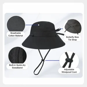Wide brim bucket hat with bow tie, breathable cotton, adjustable windproof strap for women.
