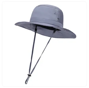 Detailed view of the grey sun hat featuring a wide brim and adjustable wind rope.