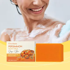 Vue détaillée du savon au lait de chèvre et kaki OceAura avec sa boîte d'emballage.