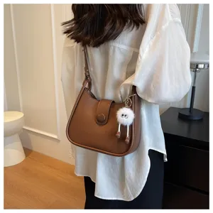Trendy brown leather shoulder crossbody bag for women, simple casual daily handbag with charm