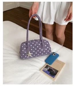 Sweet girl polka dot bowling bag underarm handbag with charm for women stylish daily use.