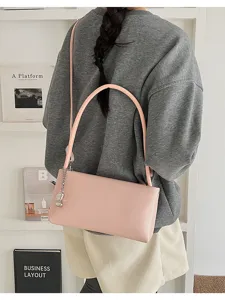 Chic pink baguette shoulder bag for women, minimalist underarm leather purse for casual.