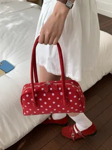 Sweet red polka dot bowling handbag for women, fashion underarm shoulder bag with large capacity.