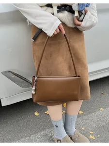 Brown underarm shoulder bag with chic chain detail, perfect for casual daily retro outfits.