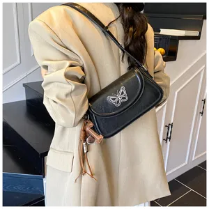 Sac à bandoulière noir pour femme avec broderie papillon, élégant sac fourre-tout quotidien.