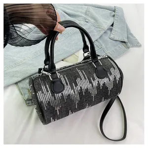 Detailed view of the trendy sequin cylinder shoulder bag, stylish crossbody handbag for women.