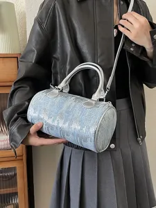 Fashionable sequin cylindrical crossbody bag for women, stylish barrel shoulder bag with handle.