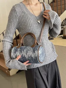 Chic tweed cylinder crossbody bag for women, trendy color block design with top handle.