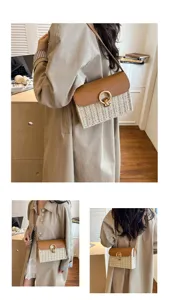 Retro straw woven shoulder bag with PU leather flap and stylish metal ring lock for beach.