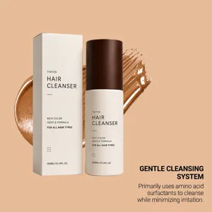 Detail shot of 300ml tinted hair cleanser bottle and box with gentle amino acid formula.