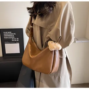 Women vintage brown leather shoulder bag casual large capacity crossbody dumpling bag.