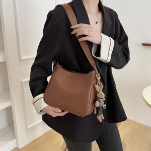Dames retro bruine bucketbag brede riem crossbody schoudertas met schattige pluche konijnenhanger