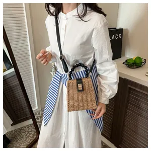 Retro straw woven bag with beaded handle and shoulder strap, stylish vintage beach bag.