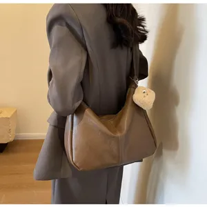 Vintage brown leather hobo shoulder bag for women, large capacity dumpling crossbody bag.