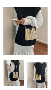 Retro straw woven crossbody bag with black leather flap, metal lock and chic beaded handle.