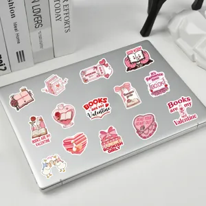 Detailed view of pink bookish waterproof stickers featuring reading themes for laptops and cases.