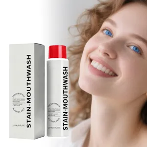 Stain-removing mouthwash with fresh breath, alcohol-free formula, 237ml daily oral care bottle.