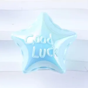 Close-up view of the blue acrylic star bead featuring vertical hole design and Good LUCK text.