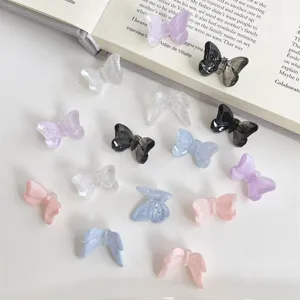 Acrylic butterfly beads detail shot, small faceted charm with back hole for DIY hair accessories.