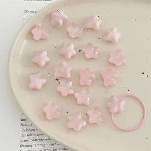 Pink acrylic star loose beads for DIY handmade jewelry accessories, detailed shot.