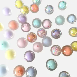 Close-up detail shot of colorful matte translucent AB plated acrylic beads for DIY handmade craft.