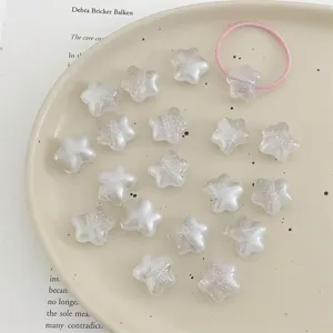 Acrylic glitter star beads and hair tie set for DIY handmade jewelry crafting projects.