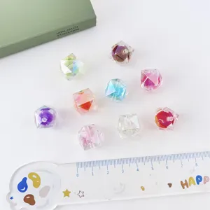 Colorful acrylic UV coated diamond cut loose beads for DIY handmade jewelry accessories detail shot.