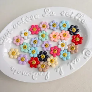 Colorful resin smiley flower cabochons for DIY crafts, bracelets, hair clips and handmade jewelry.