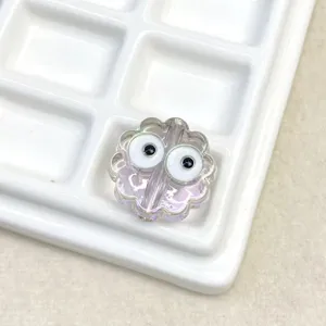 Transparent electroplated DIY cookie shaped bead detail with cute eyes for phone charms.