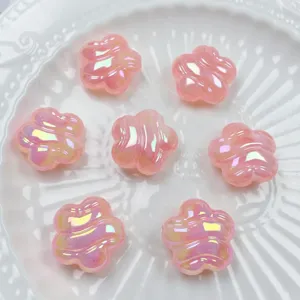Pink acrylic flower beads with aurora finish, ideal for DIY bracelets and phone charms details.