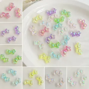 Detalle de cuenta de lazo iridiscente de acrilico, joyeria colorida transparente para pulsera DIY