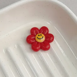Red smiley flower resin charm, cute cabochon for DIY jewelry, bracelet and hair clip making.