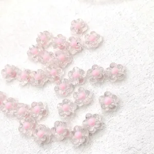 Clear acrylic flower beads with pink core for DIY jewelry accessories and crafts details.