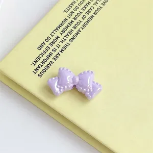 Purple acrylic double-layer bowknot charm for DIY hair accessories and cute keychains.