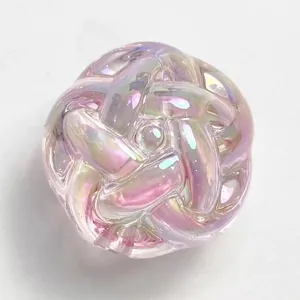 Close-up detail of the 12-18mm iridescent UV acrylic knot bead, perfect for DIY jewelry making.