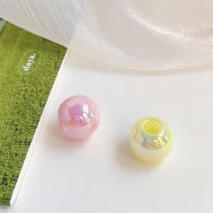 Acrylic iridescent large hole round beads detail shot for DIY jewelry making and phone charms.