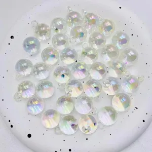 Close-up of iridescent acrylic loose beads with hanging holes for DIY jewelry making crafts.