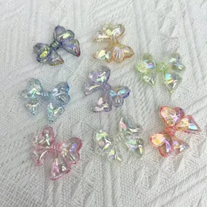 Colorful iridescent UV-plated acrylic bow charms for DIY bracelet jewelry accessories.