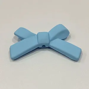 Accessorio fai da te a forma di fiocco azzurro per custodia telefono e forcine decoro