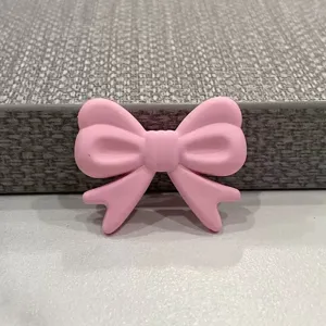 Cabochon resina fiocco rosa DIY accessorio custodia telefono materiale artigianale dettaglio.