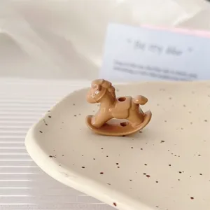 Cute brown rocking horse acrylic bead for DIY jewelry making, charm, phone strap, and bracelet.