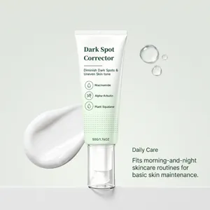 Detail view of dark spot corrector facial cream with niacinamide and soothing skincare formula.
