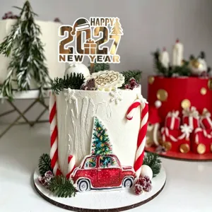 2027 New Year acrylic cake topper detail view showcasing gold party dessert decoration.