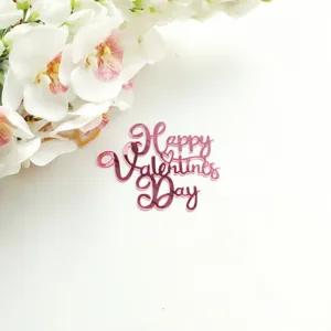 Close-up of pink acrylic Happy Valentine's Day cake topper with elegant white orchid decor.