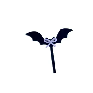 Cute bat acrylic cake topper detail shot, perfect for Halloween party decoration and cute themes.